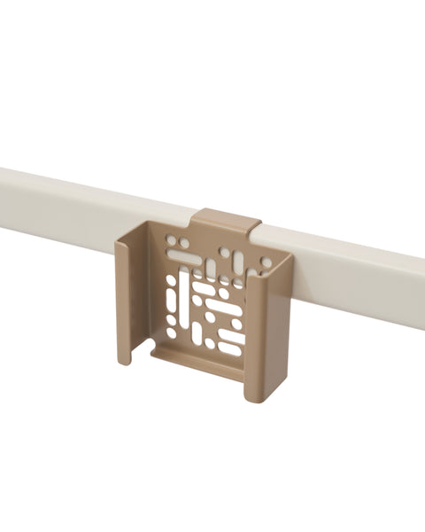 Pedestal Apple TV Mount in Sandstorm, perforated steel Apple TV bracket on a stand tube, on a plain white background