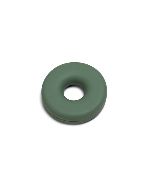 Pedestal Cable Bagel in Mossy Green, silicone cable organizer ring, on a plain white background