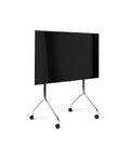 Pedestal Moon Tall TV Stand in Chrome, tall rolling TV stand on wheels holding a flat screen TV, on a plain white background