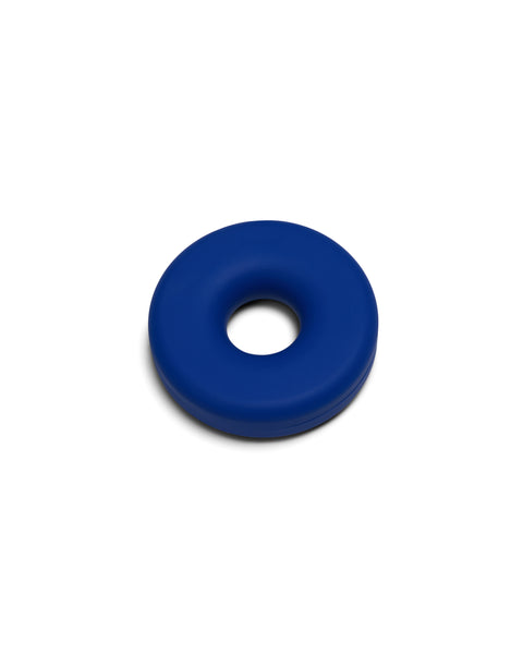 Pedestal Cable Bagel in Ultra Marine, silicone cable organizer ring, on a plain white background
