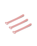 Pedestal Cable Tie in Bubble Gum, three silicone cable ties laid side by side, on a plain white background