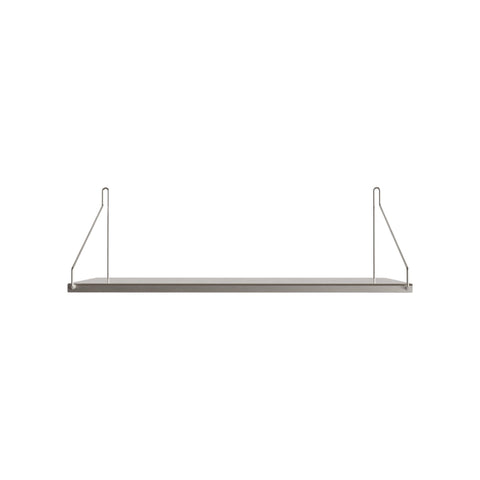 Frama Single Shelf, Stainless Steel, shallow steel shelf with wire brackets angling back to the wall, plain background