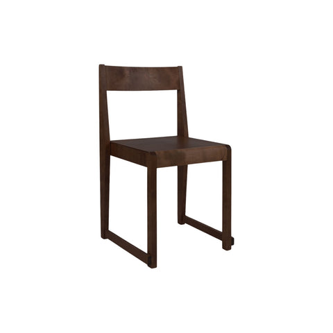 Frama Chair 01 in Dark Brown Birch, dark stained birch chair with square back and sled style legs, three quarter view on white