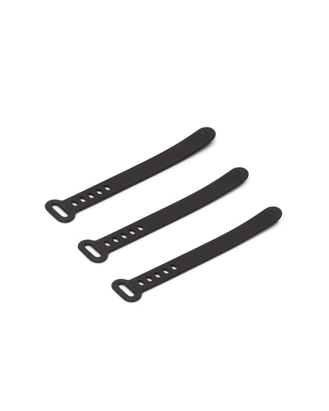 Pedestal Cable Tie in Charcoal, three silicone cable ties laid side by side, on a plain white background