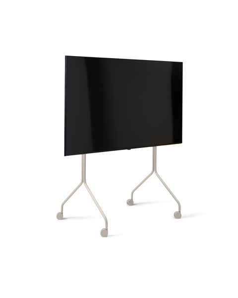 Pedestal Moon Tall TV Stand in Oat, tall rolling TV stand on wheels holding a flat screen TV, on a plain white background