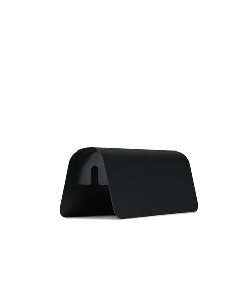 Pedestal Power Shell in Charcoal, steel cover closed over a power beam, on a plain white background