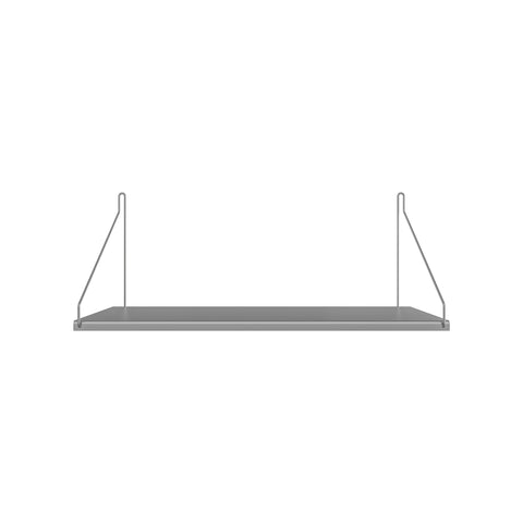 Frama Single Shelf, Stainless Steel, deep steel shelf plate carried on two triangular wire brackets, on a pale ground