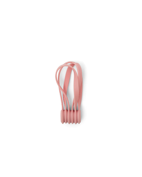 Pedestal Magnetic Cable Ties in Bubble Gum, three magnetic silicone cable ties, on a plain white background