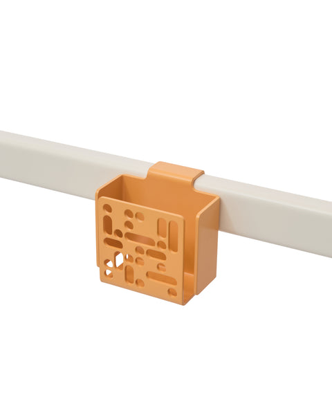 Pedestal Remote Box Mount in Apricot, perforated aluminium remote box on a stand tube, on a plain white background