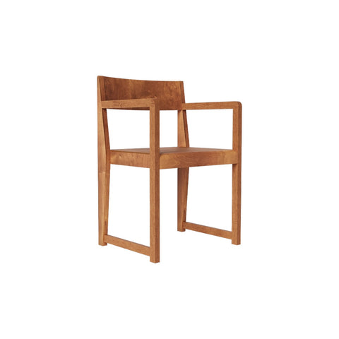 Frama Armrest Chair 01 in Warm Brown Birch, birch chair with open arms and a low back rail, three quarter view on white