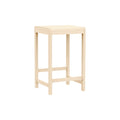 Frama Stool 01 in Natural Birch, shorter counter height stool in pale birch, angled view showing the cross braced stretchers