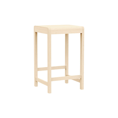 Frama Stool 01 in Natural Birch, shorter counter height stool in pale birch, angled view showing the cross braced stretchers