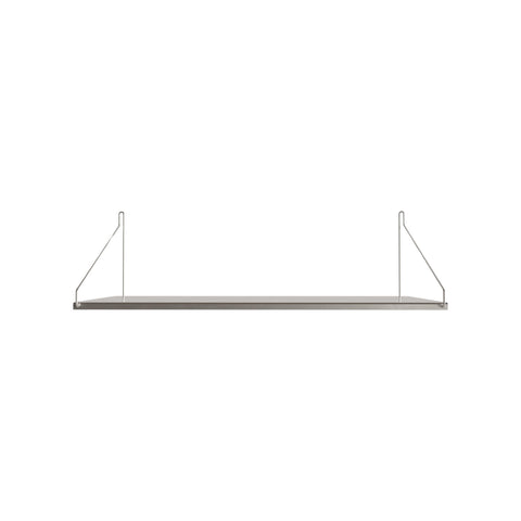 Frama Single Shelf, Stainless Steel, wide deep shelf in brushed steel with slim wire brackets at each end, on white