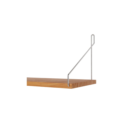 Frama Single Shelf, Natural Oak in Stainless Steel, close up of one shelf end where the bent steel bracket meets the oak board