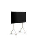 Pedestal Moon Light TV Stand in Oat, compact TV floor stand holding a flat screen TV, on a plain white background