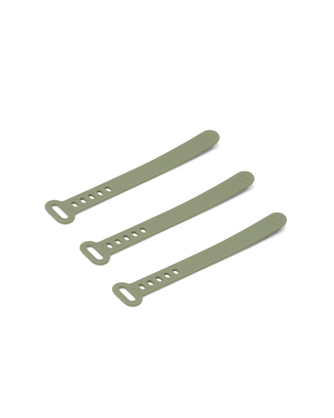Pedestal Cable Tie in Mossy Green, three silicone cable ties laid side by side, on a plain white background