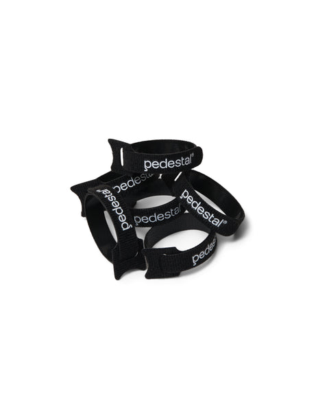 Pedestal Velcro Cable Ties in Black, reusable Velcro cable ties, on a plain white background