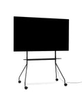 Pedestal Moon PRO TV Stand in Charcoal, mobile rolling TV stand with shelf holding a flat screen TV, on a plain white background