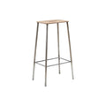 Frama Adam Stool, tall stool viewed from the side, long steel legs with a footrest brace set below the leather seat