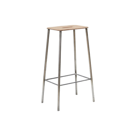 Frama Adam Stool, tall stool viewed from the side, long steel legs with a footrest brace set below the leather seat