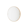 Frama CM-1 Circle Mirror, large round mirror filling the frame with a thin oak rim and two brass fixing points