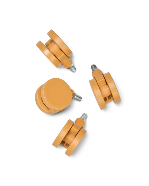 Pedestal Wheels in Apricot, set of four furniture wheels, on a plain white background