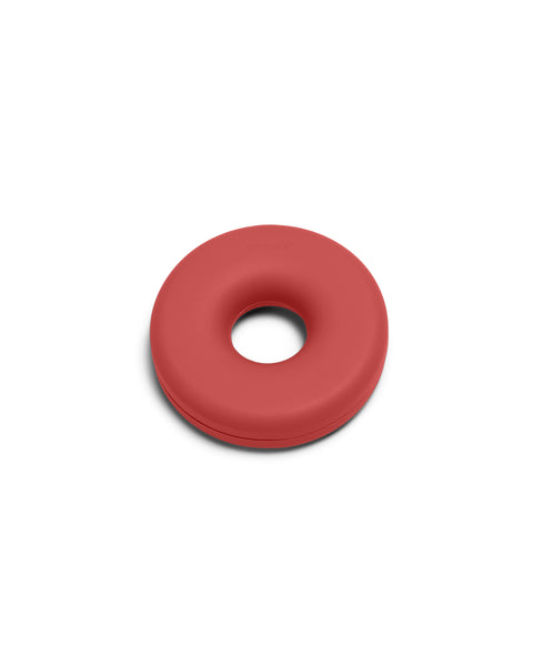 Pedestal Cable Bagel in Burnin' Red, silicone cable organizer ring, on a plain white background