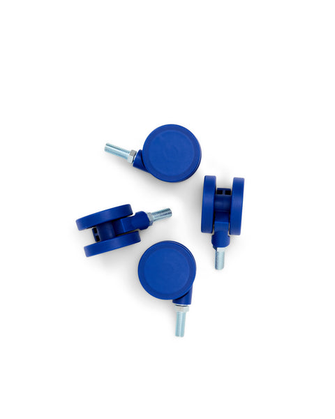Pedestal Wheels in Ultra Marine, set of four furniture wheels, on a plain white background