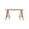 Frama Folding Flat Trestle Table in Warm Brown Birch, birch top resting on two A frame trestle legs, seen from the front on white