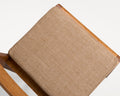 Frama Bar Chair 01 Cushion in Camel, camel woven cushion tied onto the wooden seat of a Frama bar chair, seen from above