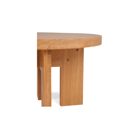 Frama Farmhouse Side Table in Natural Oak, round oak table top on thick solid plank legs, angled view on white