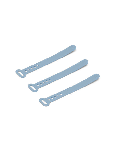 Pedestal Cable Tie in Powder Blue, three silicone cable ties laid side by side, on a plain white background