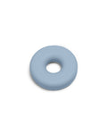 Pedestal Cable Bagel in Powder Blue, silicone cable organizer ring, on a plain white background