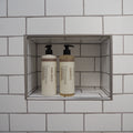 Humdakin 01 Shampoo, Chamomile & Sea Buckthorn, hair shampoo, shampoo and conditioner in a white subway-tiled shower niche