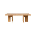 Frama Farmhouse Coffee Table in Natural Oak, long rectangular oak top on paired plank legs, seen from the side on white