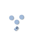 Pedestal Cable Dots in Powder Blue, silicone cable dots with a mounting clip, on a plain white background