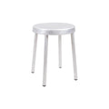 Frama Tasca Stool in Aluminum, stool with a round seat and four tapered legs, small in frame on a pale background