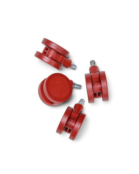 Pedestal Wheels in Burnin' Red, set of four furniture wheels, on a plain white background