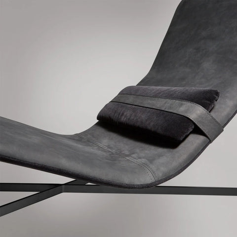 Blu Dot Deep Thoughts Leather Chaise close-up detail in ink leather with coordinating ink velvet lumbar pillow on black powder-coated steel base