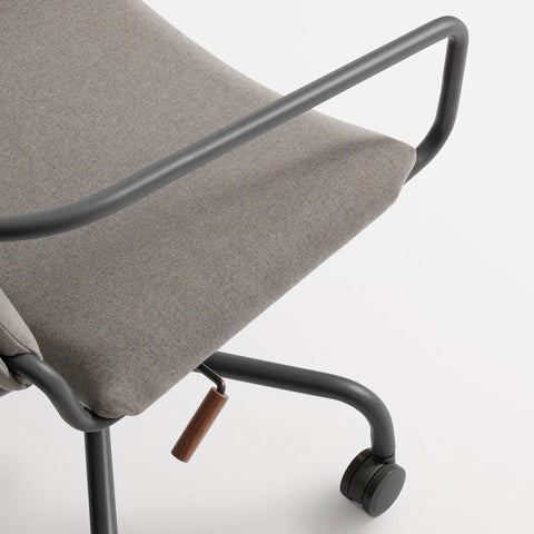 Blu Dot Daily Task Chair in Gingrich Charcoal detail shot showing fabric upholstery, charcoal steel frame and walnut tilt lever