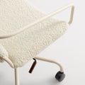 Blu Dot Daily Task Chair in Tidbit Ivory detail shot showing boucle upholstery, ivory steel frame and walnut tilt lever