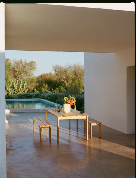 Muuto Assemble outdoor table and benches in FSC certified teak by poolside