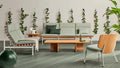 Perch Outdoor 3 Seat Sofa by Blu Dot in Sunbrella Haze with White frame, styled in an outdoor setting with Perch Lounge Chair