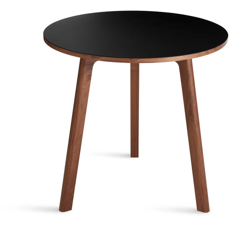 Blu Dot Apt 30-inch Round Cafe Table with black linoleum top and walnut base on white background