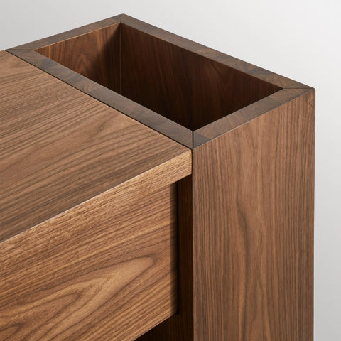 Blu Dot Go Forth Bench in walnut, close-up of side umbrella storage compartment.