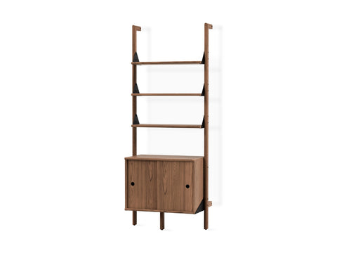 Gus* Modern Branch-1 Storage Unit, walnut wall shelving unit with cabinet, walnut uprights and shelves with black brackets, on white