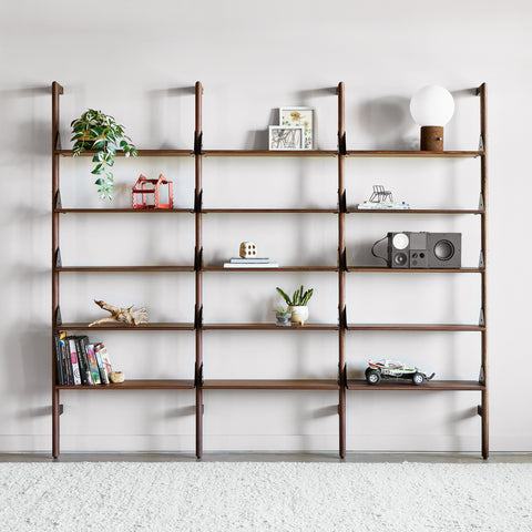 Gus* Modern Branch-3 Shelving Unit, walnut wall shelving, walnut shelves with black brackets styled with books and plants