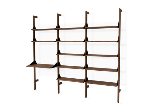 Gus* Modern Branch-3 Shelving Unit with Desk, walnut three bay wall shelving unit with desk, walnut uprights and shelves with black brackets, on white