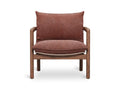 Gus* Modern Humber Lounge Chair, walnut frame lounge chair, Regency Beet upholstery, front view on white
