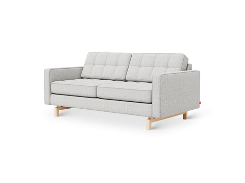 Gus* Modern Jane 2 Loft Sofa, tufted apartment sofa, Robarts Sauble light grey with natural ash base, three-quarter view on white